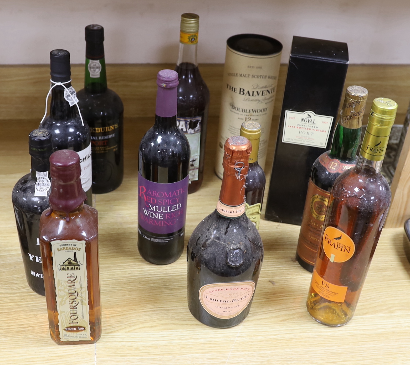 Collection of mixed spirits and port including Churchills reserve and Cockburns special reserve